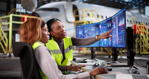 Skilled woman aircraft mechanic conducting safety check in African hangar