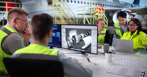 Diverse aerospace team conducting safety checks on jet engine